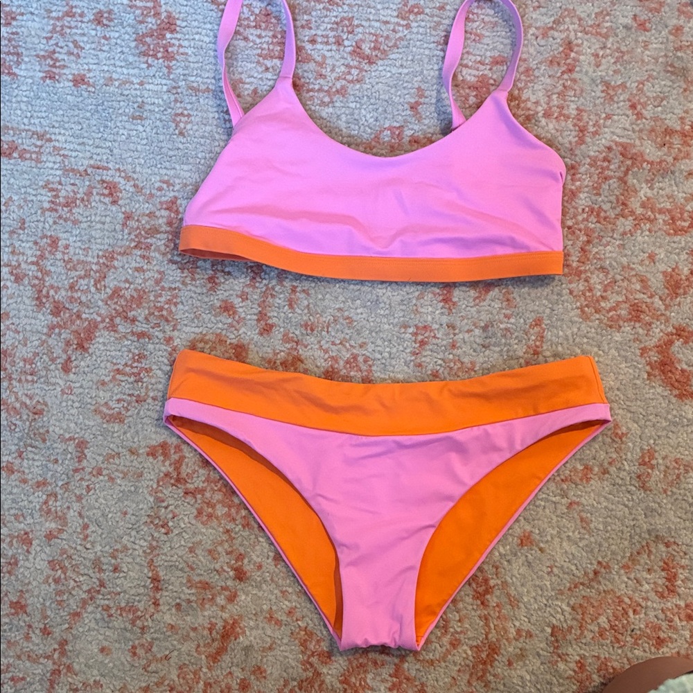 Jolyn Orange and pink bikini. Minerva bottoms Diana top. Size Small